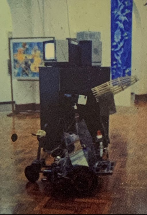 Baharudin Mohd Arus’s art installation, The Medium is the Message (After Marshall McLuhan), which features two television sets and a lawnmower carrying a video camera.